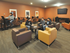 Inviting common area with modern seating, warm lighting, and a friendly atmosphere for socializing or studying.