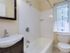 Full bathroom at Harvard Village Apartments in Adams Morgan