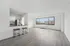 Bright Living Room with Breakfast BAr Ashlawn at Southern Towers