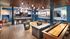 shuffle board and seating in amenity space