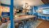 seating area near kitchenette of amenity space