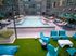 seating area by swimming pool