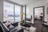 Living area featuring full-length windows  at The Henry | Apartments in Tampa, FL