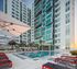 Lounge chairs and pool  at The Henry | Apartments in Tampa, FL