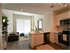 Open concept living area kitchen, dining  at The Henry | Apartments in Tampa, FL.