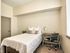 Bedroom with desk at The Henry | Apartments in Tampa, FL