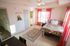 Bedroom with storage opening into bathroom| Wildwood Lubbock | Lubbock Apartments Near TTU