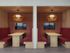 Booth seating with TVs in clubhouse