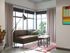 Living rooms furnished with couch and coffee table