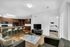 Spacious living room | The Cardinal at West Center | Off Campus Apartments near University Of Arkansas
