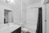 Bathroom | The Cardinal at West Center | Off Campus Apartments near University Of Arkansas