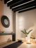 Serene meditation corner with soft lighting, modern decor, and a calming atmosphere perfect for relaxation.
