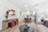 Inviting open-concept living space with modern decor, featuring a cozy seating area, chic dining nook, and bright kitchen with stainless steel appliances.