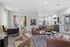 Chic and modern leasing office with stylish seating, elegant decor, and ample natural light.