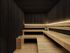 Luxurious wooden sauna with ambient lighting and modern design, perfect for relaxation and rejuvenation.