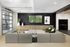 Modern living space with sleek gray sectional sofa, stylish green chairs, and wall-mounted TVs perfect for entertainment.