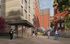 Vibrant student-friendly apartment complex with modern architecture, spacious walkways, and lush greenery.