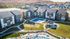 Aerial view of a modern apartment complex with sleek buildings, landscaped green spaces, a basketball court, and inviting swimming pool area, perfect for vibrant community living.