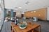 Sophisticated lobby area featuring modern decor with stylish seating, elegant vases, and ambient lighting.