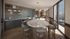 Contemporary kitchen-dining area with elegant marble island and panoramic floor-to-ceiling windows, offering stunning hillside views.