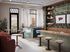 Chic and cozy cafe-style lounge with plush seating, stylish bar stools, and elegant decor, perfect for a relaxing social gathering.