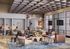 Modern communal lounge with cozy seating, stylish decor, and vibrant atmosphere, perfect for social gatherings and relaxation.