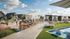Luxurious rooftop lounge featuring stylish cabanas, scenic views, and a refreshing pool area perfect for social gatherings.