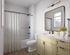 Bright and modern bathroom featuring sleek vanity with quartz countertop, elegant mirror, and stylish fixtures.