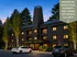 Charming Baker House Residence nestled among lush trees, offering elegant living spaces now leasing for Spring & Fall 2027.