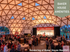 Vibrant event space at Baker House featuring a striking geodesic dome ceiling, bustling alumni gathering, and elegant decor.
