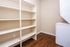 11 West Apartments - Storage and Laundry Area in Unit
