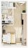 Charming studio apartment layout featuring a cozy bedroom area, modern kitchen, and stylish bathroom.