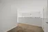 Spacious loft bedroom with plush carpeting