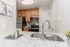 Stylish kitchen at Hampton Point Apartment with sleek stainless steel appliances and beautiful granite countertops.