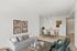 Stylish open-plan living and dining area featuring modern furniture and tasteful decor.