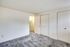 Bright Meadows Townhomes bedroom showcasing two closets and a plush carpeted floor for comfort.