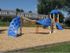A vibrant playground at Bright Meadows Townhomes featuring a colorful slide and play area for children to enjoy.