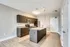 A stylish modern kitchen equipped with stainless steel appliances and refined cabinetry.