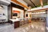 A chic, modern lounge with a stylish bar, comfortable seating, and sophisticated lighting, perfect for all residents to enjoy.