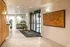 Bright and inviting lobby with modern decor and a historical map on the wall.