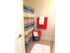 Shower featuring a decorative curtain and towels at the Reserve at Sawmill.