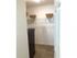 Two bedroom oak closet at Reserve at Sawmill.