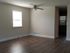 Empty living room in a two-bedroom townhome at Reserve at Sawmill.