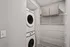 Laundry room at Lofts at Yard 56 featuring a washer and dryer, neatly arranged for convenience and efficiency.