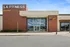 Front view of LA Fitness near Lofts at Yard 56, highlighting the gym's entrance and logo.