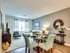 Bright living room and dining space at Union Flats, showcasing stylish furnishings and ambiance.