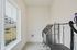 Bright and spacious pet grooming room with large window, featuring modern washing and drying stations at Emerson Flats.