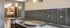 Modern lobby mailbox area with stylish lighting and sleek, metallic design in a luxury apartment complex.