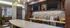 Chic Bilotta kitchen with pendant lighting, sleek countertops, and a pebble backsplash for stylish entertaining.