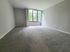 Bright, spacious room with lush green views, perfect for relaxation and comfort.